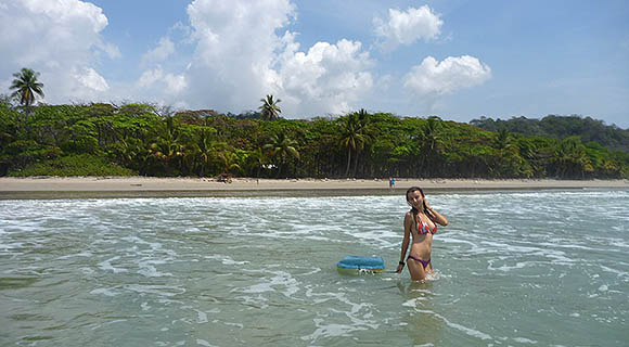 Hot bikini girl at Costa Rich with boogie board