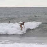 Surf girl at Pavones break
